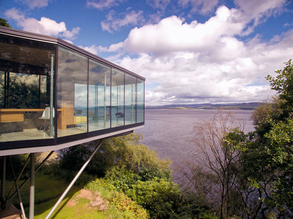 Roxburgh McEwan Architects. The Tea Hut - Cantilevered glazed hut overlooking loch.