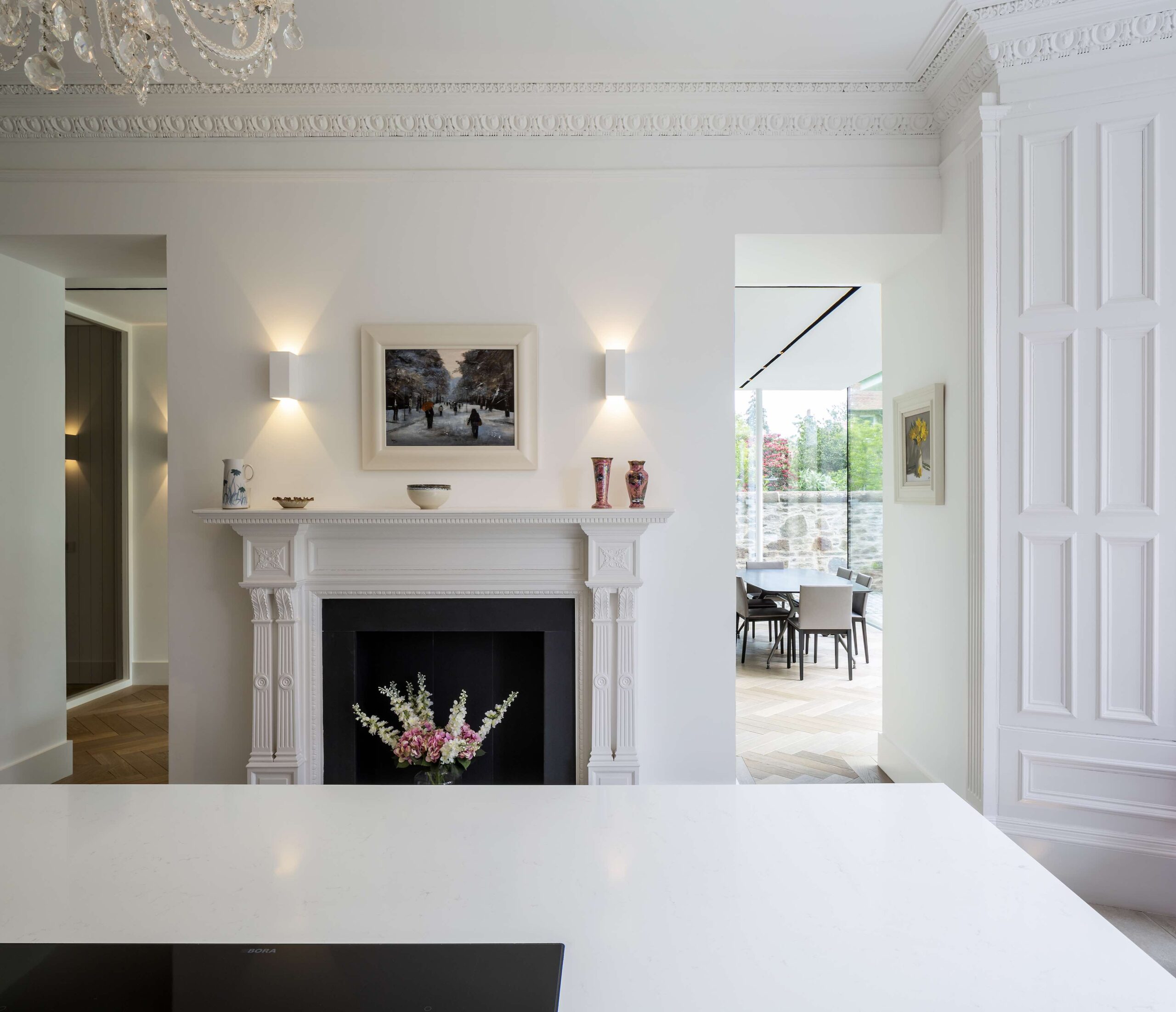 Roxburgh McEwan Architects. Edinburgh villa renovated kitchen with fireplace.