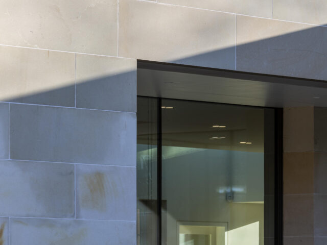 Roxburgh McEwan Architects. Garden villa extension - Stone and window detail.