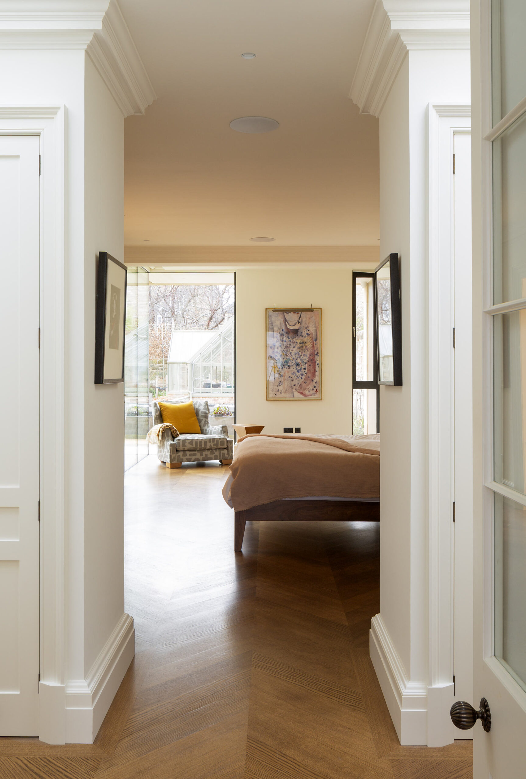 Roxburgh McEwan Architects. Edinburgh villa extension - Internal view through master bedroom.