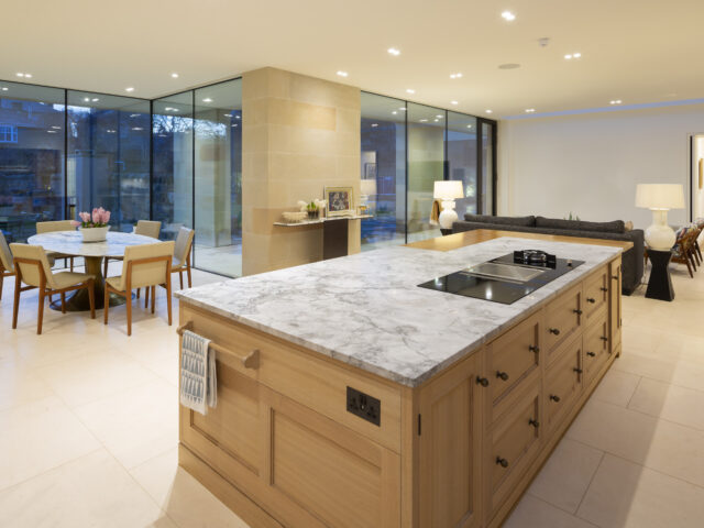 Roxburgh McEwan Architects. Edinburgh villa extension - Kitchen/living/dining areas with views out to rear garden.